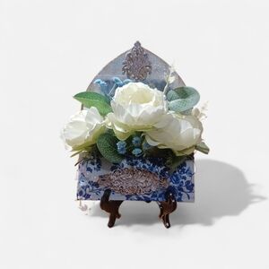 Elegant Floral Arrangement with Blue and White Accents